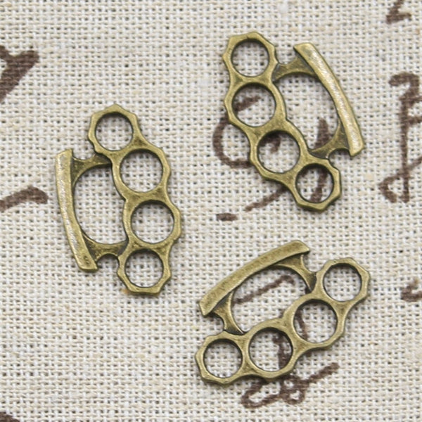 12pcs Charms AI Punch Knuckle Dusters 24x14mm Antique Silver Color Plated Pendants Making DIY Handmade Tibetan Finding Jewelry
